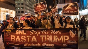 151223113835-donald-trump-snl-protest-super-169